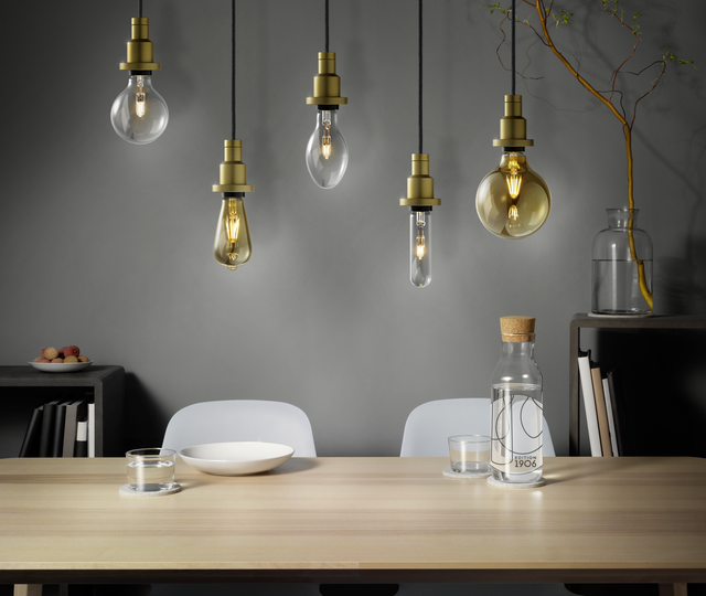 Osram Edition 1906 PenduLum gold with vintage look in dining room